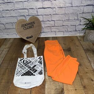 Lululemon Wunder Under High-Rise Tight 25"
Orange Soda size 6